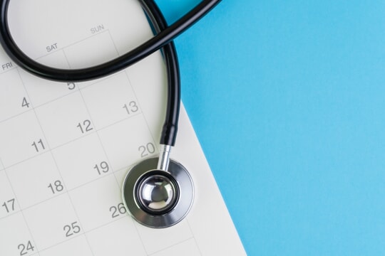 Stethoscope is placed at the top of the calendar